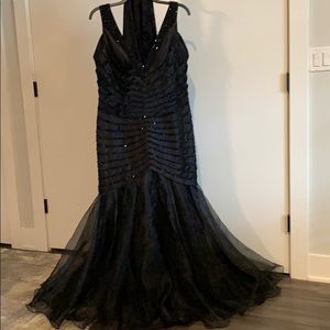 Black woman’s formal gown.